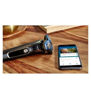 Philips Series 7000 Wet &amp;amp; Dry Electric Shaver with Charging Station, Cleaning Pod, Pouch - S7788/55